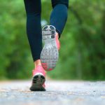 Running woman in the forest.