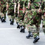Soldiers marching in line