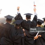 Graduation, group and back view of students celebrate education success. Behind of excited graduates at campus celebration for study goals, university award and learning motivation for happy future
