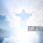 Silhuette of Jesus Christ in blue sky