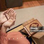 Muslim islam woman in white session lift two hand for praying ,isolated on white background. Concept for islamic pray, Ramadan, Eid al Fitr, eid ad-ha, meditation.