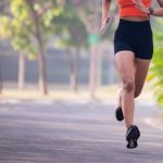 Female runner in a park stock photo