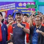 Sekjen ATR/BPN Ikuti Laga Eksibisi Pembukaan Kejuaraan Bulutangkis HUT ke-54 KORPRI